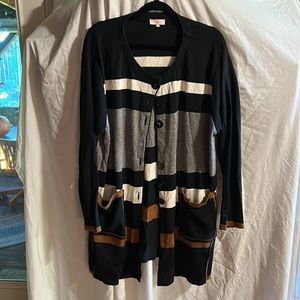 Trim color sweater with black grey and brown. Classy